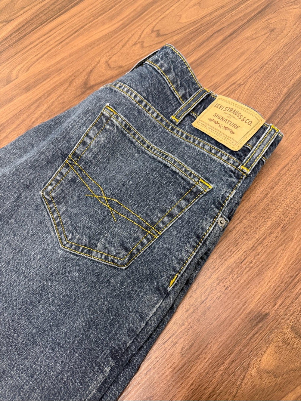 Levi Strauss & Co. Signature men’s bootcut jeans in classic blue denim
